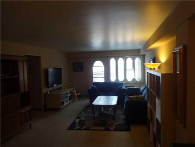 Living Room. Spacious Living Room Affords Many Pos