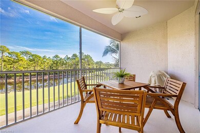 Sunroom / solarium with a water view