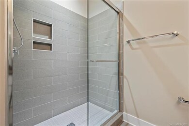 The Owner's Bathroom features a large walk in show