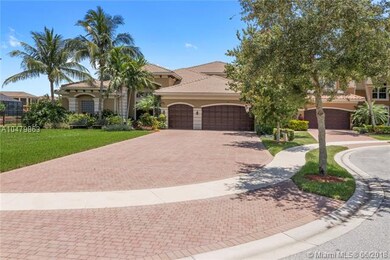 Driveway easily parks 12 cars plus 3 car garage
