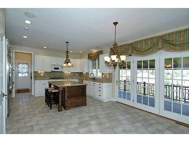 Kitchen. The informal dining area and window wall 