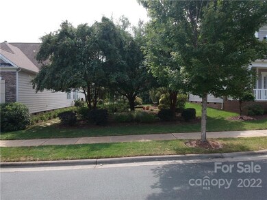 Front view of lot, which is currently a garden designed by current owners.