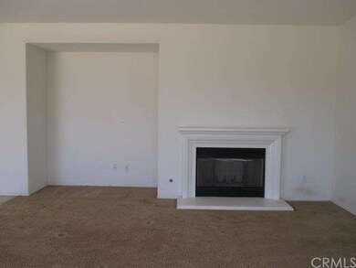 FAMILY ROOM WITH MEDIA NICHE AND FIREPLACE