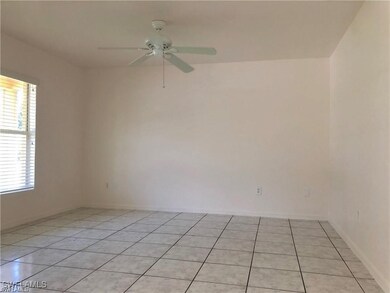 Spare room featuring plenty of natural light, ligh