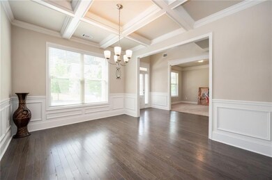 Unfurnished dining area with beamed ceiling, coffe