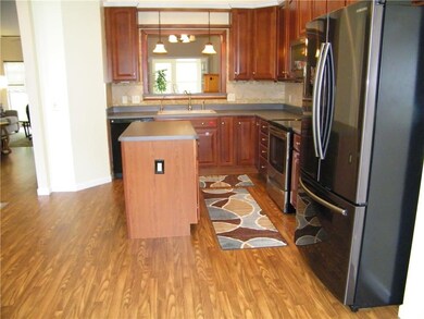 This end of the kitchen has a window looking into 