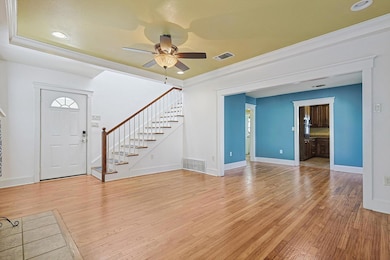 View of Entry, staircase, and dining