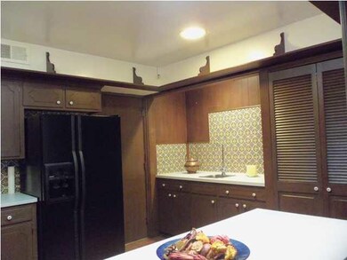 Pantry and wet bar in kitchen area