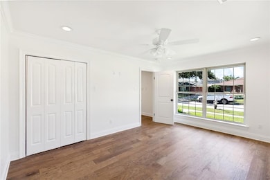 YOU WILL LOVE YOUR LARGE NEW OFFICE OR YOUR GUEST ROOM ON THE FIRST FLOOR WITH  STEPS TO AN AWESOME FULL BATH BOASTS BEAUTIFUL HICKORY WOOD FLOORS!!! COMPLETE WITH CUSTOM CLOSET!!