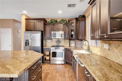 The kitchen has plenty of countertop and storage s