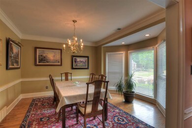 Charming dining room with lots of light from bay w
