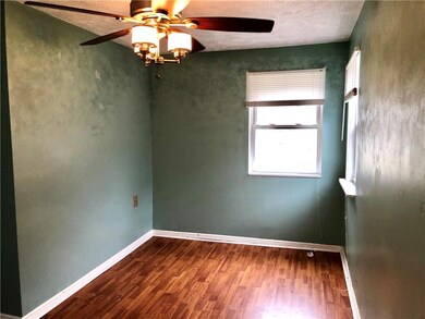 The 14'x8' Master Bedroom displays a decorative pa