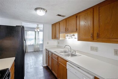 KITCHEN: The kitchen offers a double basin sink. s