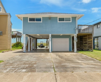 In addition to the enclosed garage, the covered ca