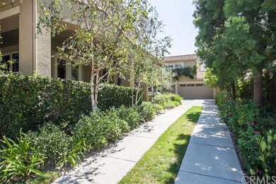 Expansive setback to 3-car garage with overhead ca
