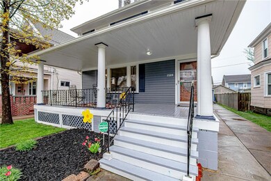 A classic front porch greets you as you arrive.