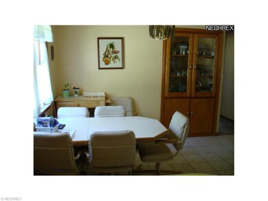 LARGE EAT-IN-KITCHEN WITH BUILT IN GLASS CABINET