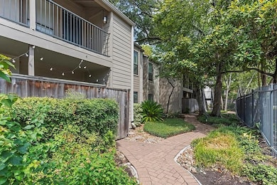 Walking to the home, you are welcomed with a stunning with a brick paved pathway that will take you to your community pool and is perfect for taking a stroll to enjoy the mature trees and lush greenery that is maintained by the management company.