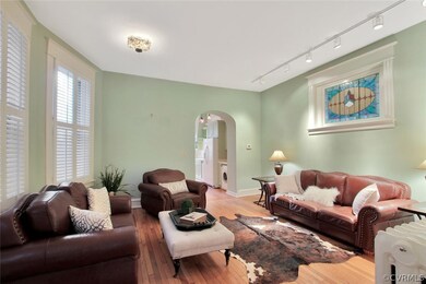 20' x 14' dining room or family room. Note stained glass window, original to the house.