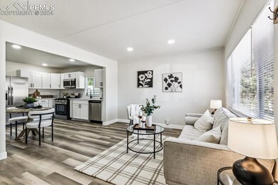 Living room featuring hardwood / wood-style floors