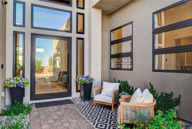 Entrance to property featuring small courtyard.