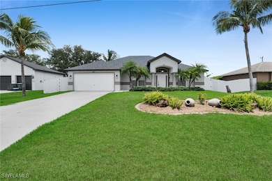 Ranch-style house with driveway, an attached garag
