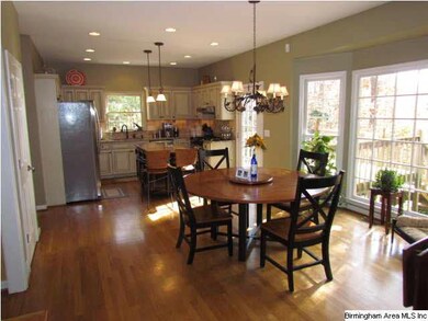 Huge eat-in kitchen with bay window, hardwood floo
