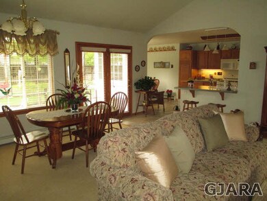 Standing from gas fireplace looking toward kitchen