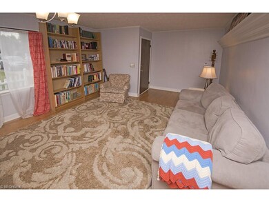 The 18x13 living room features hardwood floors and