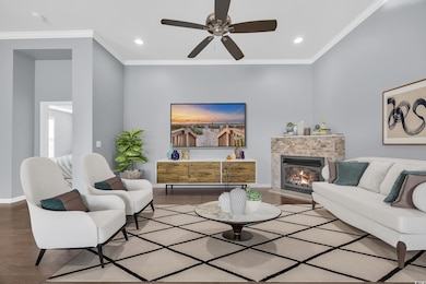 Living room featuring a tile fireplace, wood finis