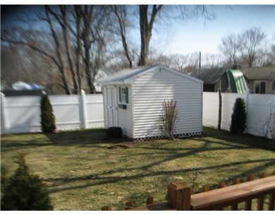 Exterior Back. Back yard has a shed for your lawn