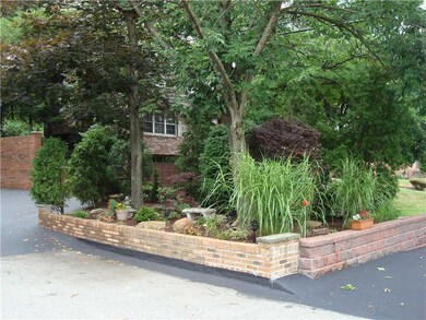 Exterior Front. Beautifully Landscaped