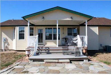 Composite Decking and a fabulous rock patio.