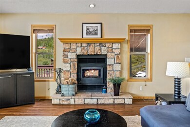 Living area with wood finished floors and a textur