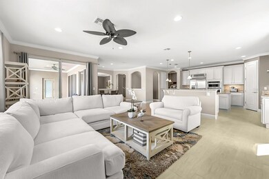Effortlessly elegant, this open-concept family room blends seamlessly with the kitchen and extends to the tranquil poolside lounge. Layered in soft whites, creams, and warm taupes, it's a masterclass in casual luxury - designed for those who live for calm spaces and understated sophistication.