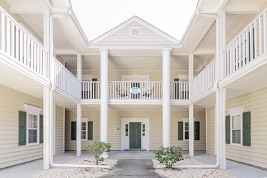 Exterior space featuring a balcony and a patio