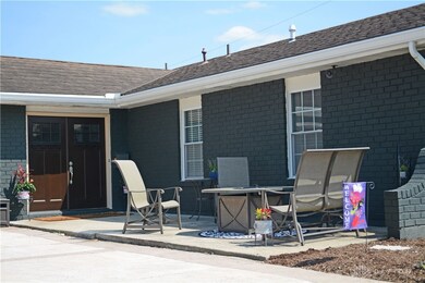 A front porch gathering area is always in style!