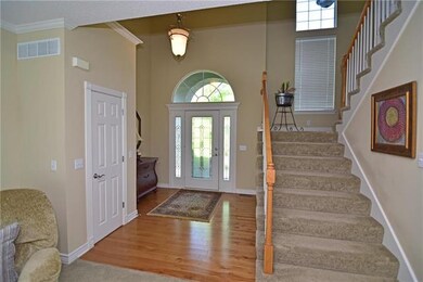 Entry opens into the great room with staircase to 