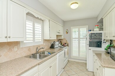 Kitchen with all white appliances.