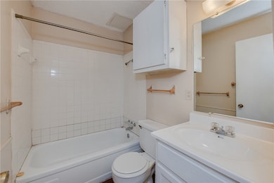Full bath featuring vanity, bathing tub / shower c