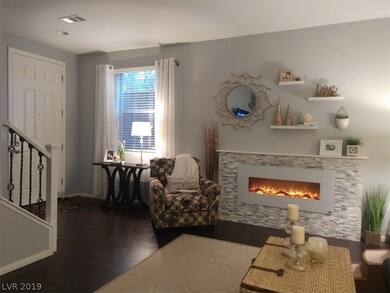 INVITING LIVING ROOM WITH ELECTRIC FIREPLACE