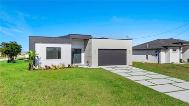 Contemporary home with stucco siding, an attached