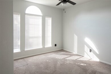Large secondary bedroom with huge windows!