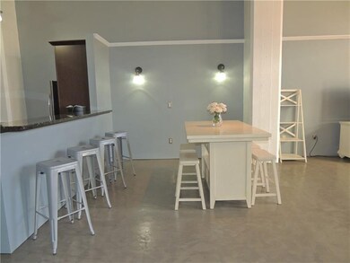 New light fixtures flank the dining area. Lots of 