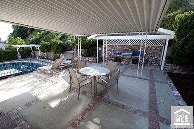 The covered patio gives respite from the sun.  Jus