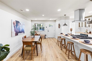 Dining area featuring light hardwood / wood-style 