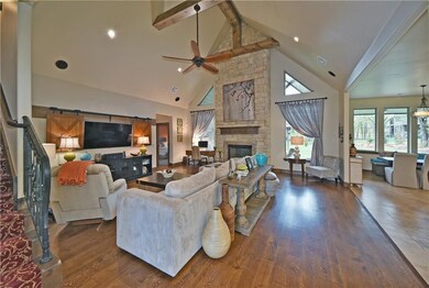 Living room view from entry. Stunning stacked ston