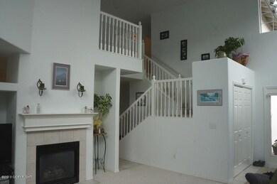 Living Room With 2 Story Ceilings
