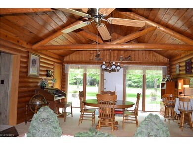 Dining room, kitchen area, front door.