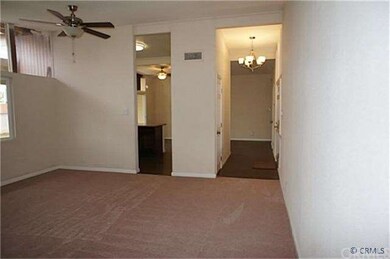 Living Room looking into kitchen and hallway from 